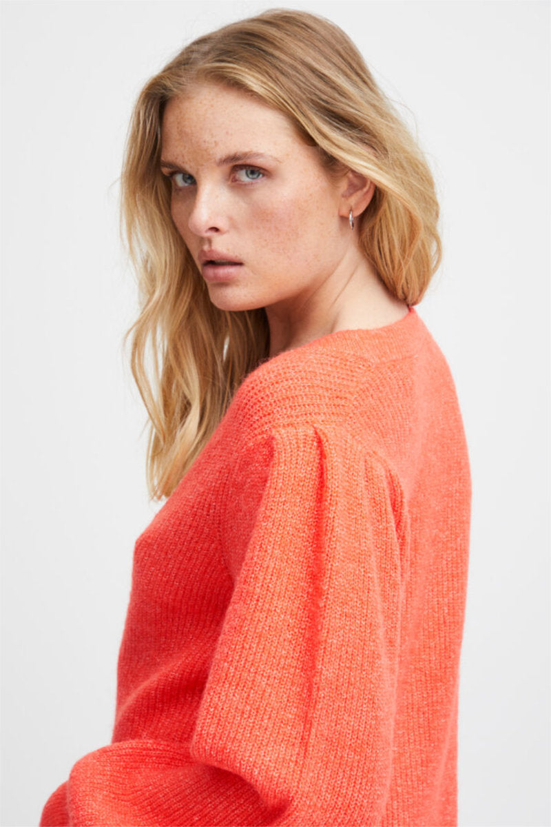 Dusty cardi, bright coral