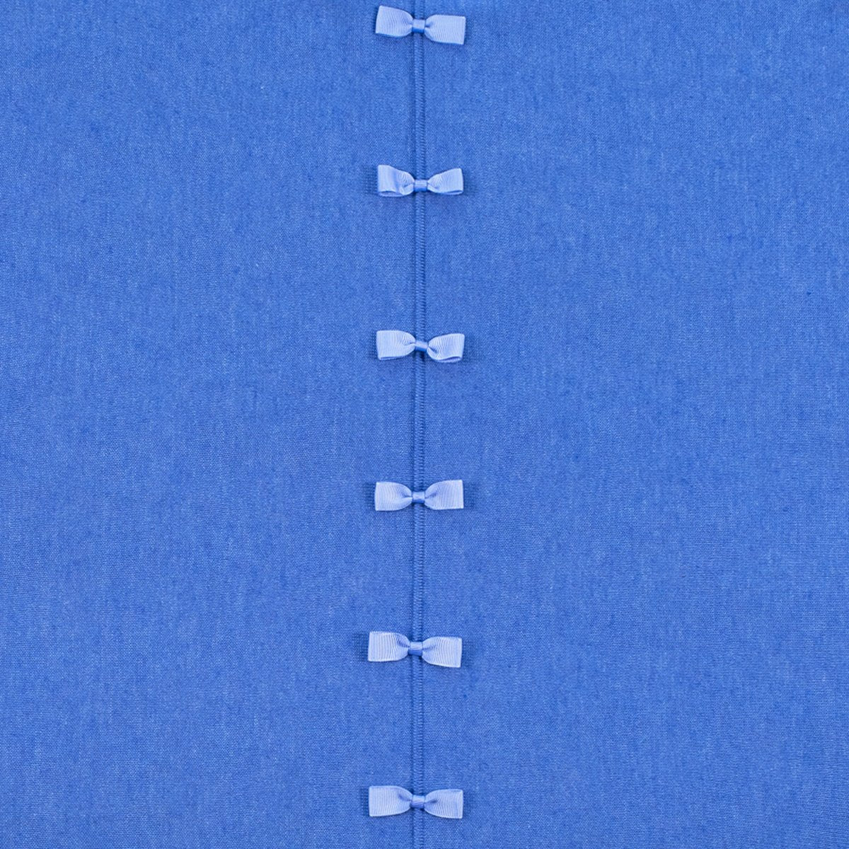 Ginger Toby bow back jumper, blue, detail view