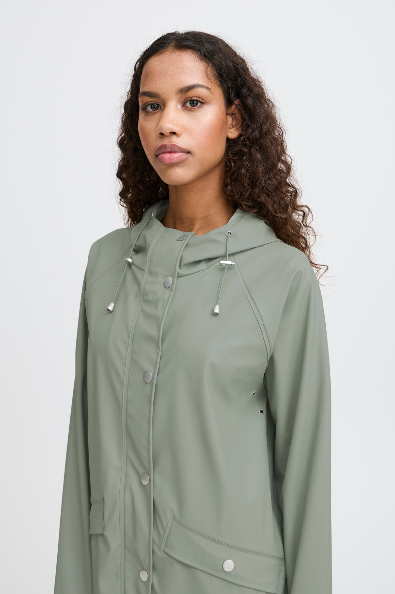 Tazi raincoat, sea green