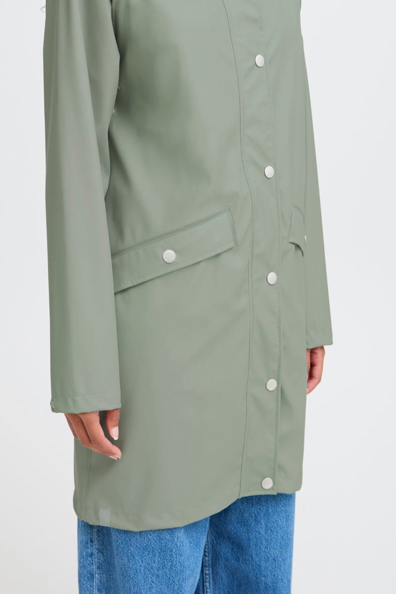 Tazi raincoat, sea green