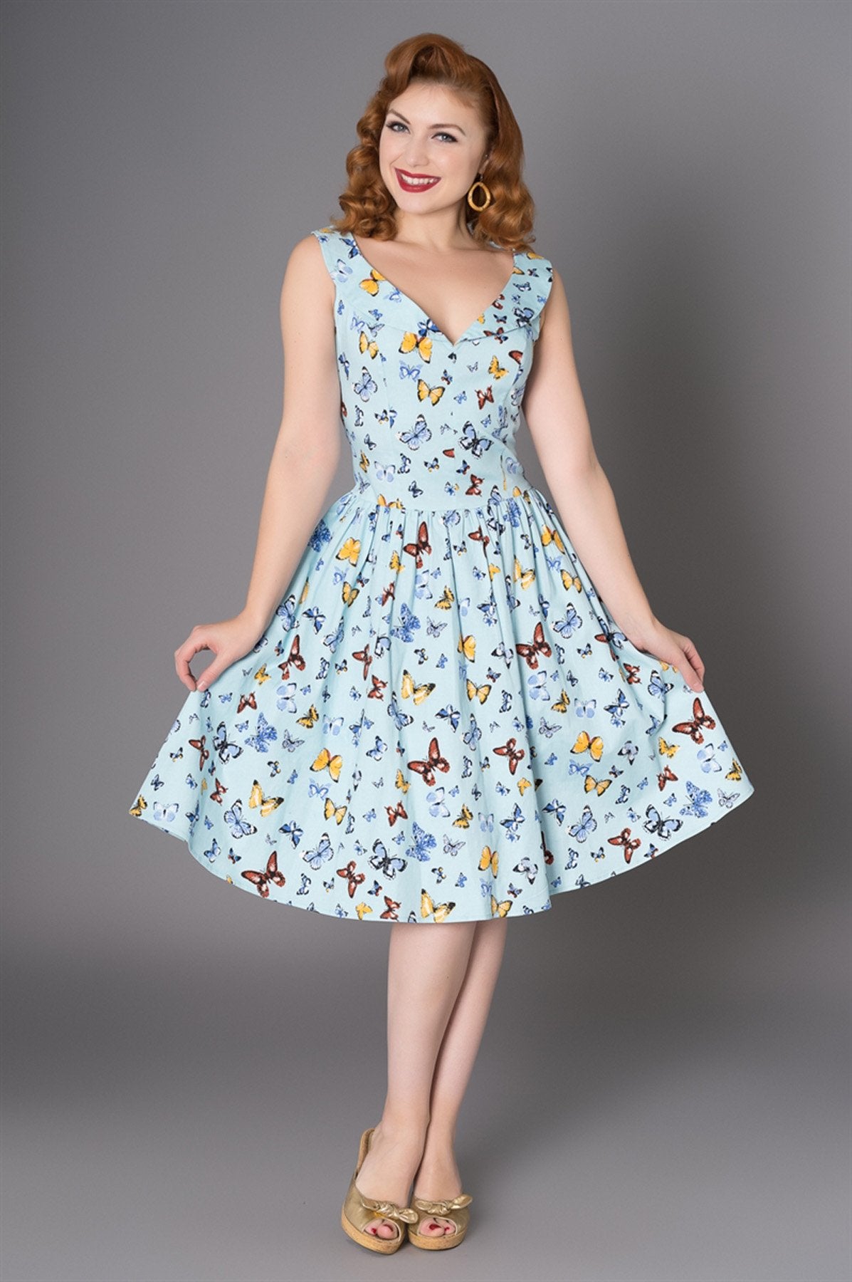 Sheen Macy shawl collar dress, butterfly pattern, aqua, front view