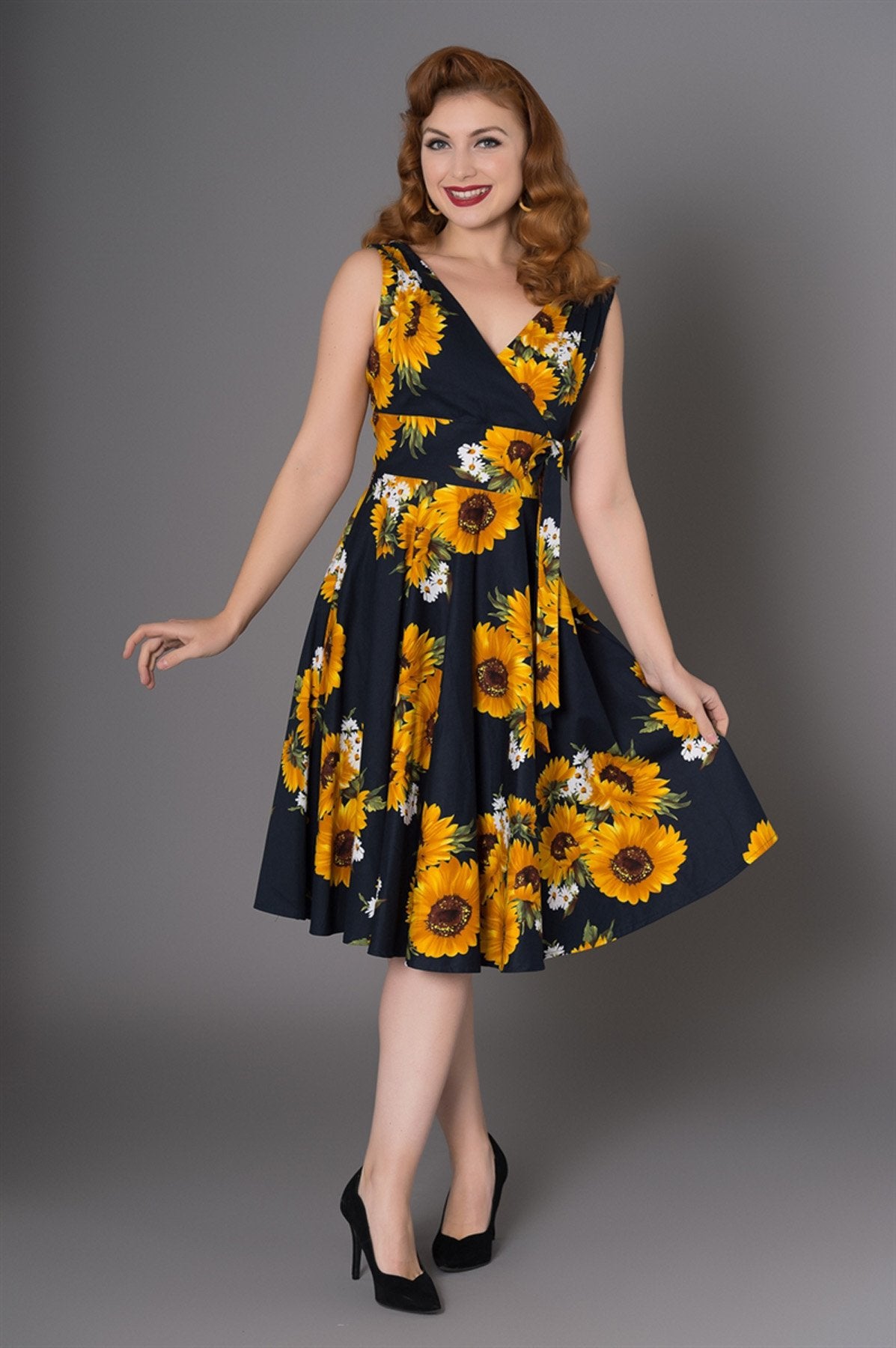 Sheen Ella sleeveless dress, sunflower design, black, front view