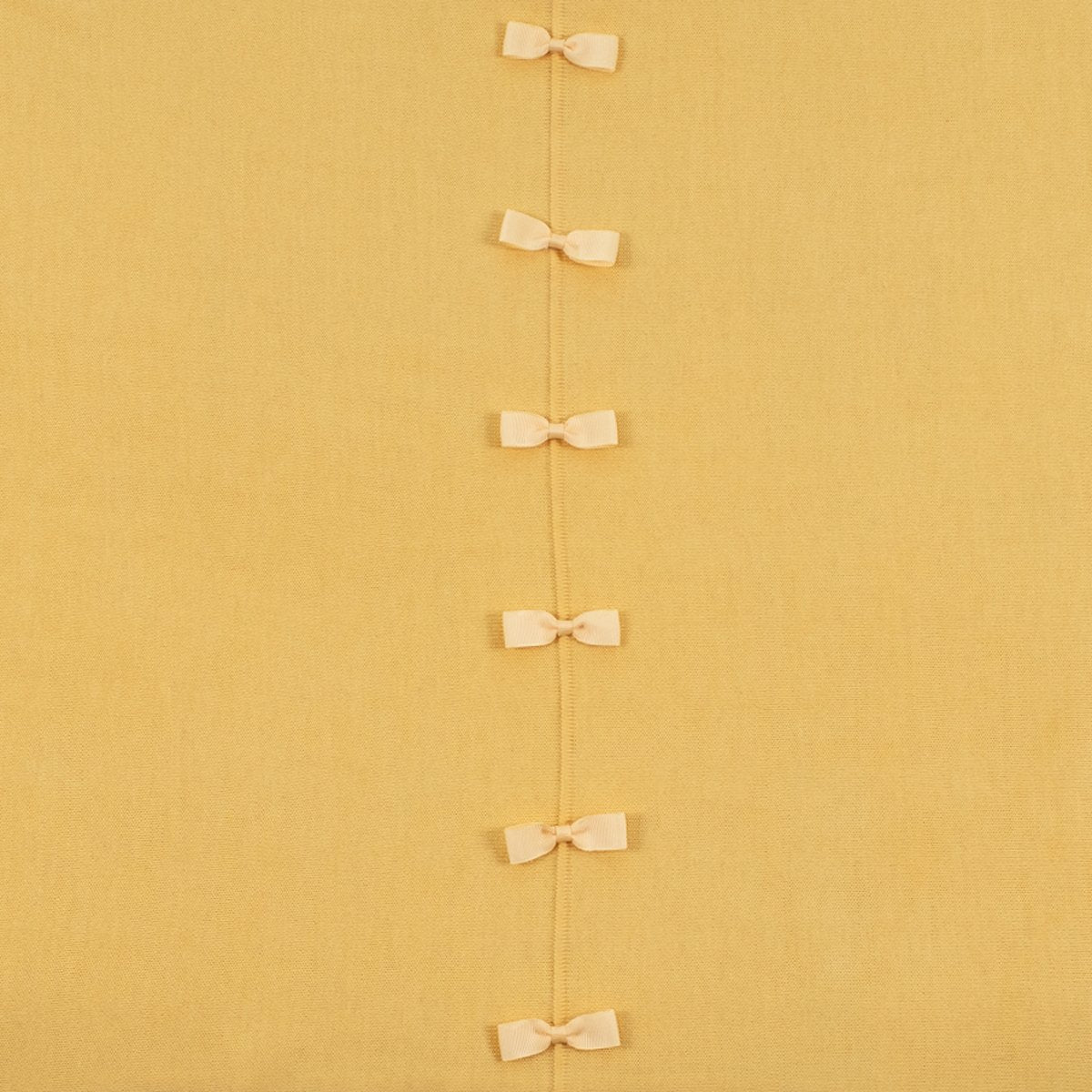 Ginger Toby bow back jumper, primrose, detail view