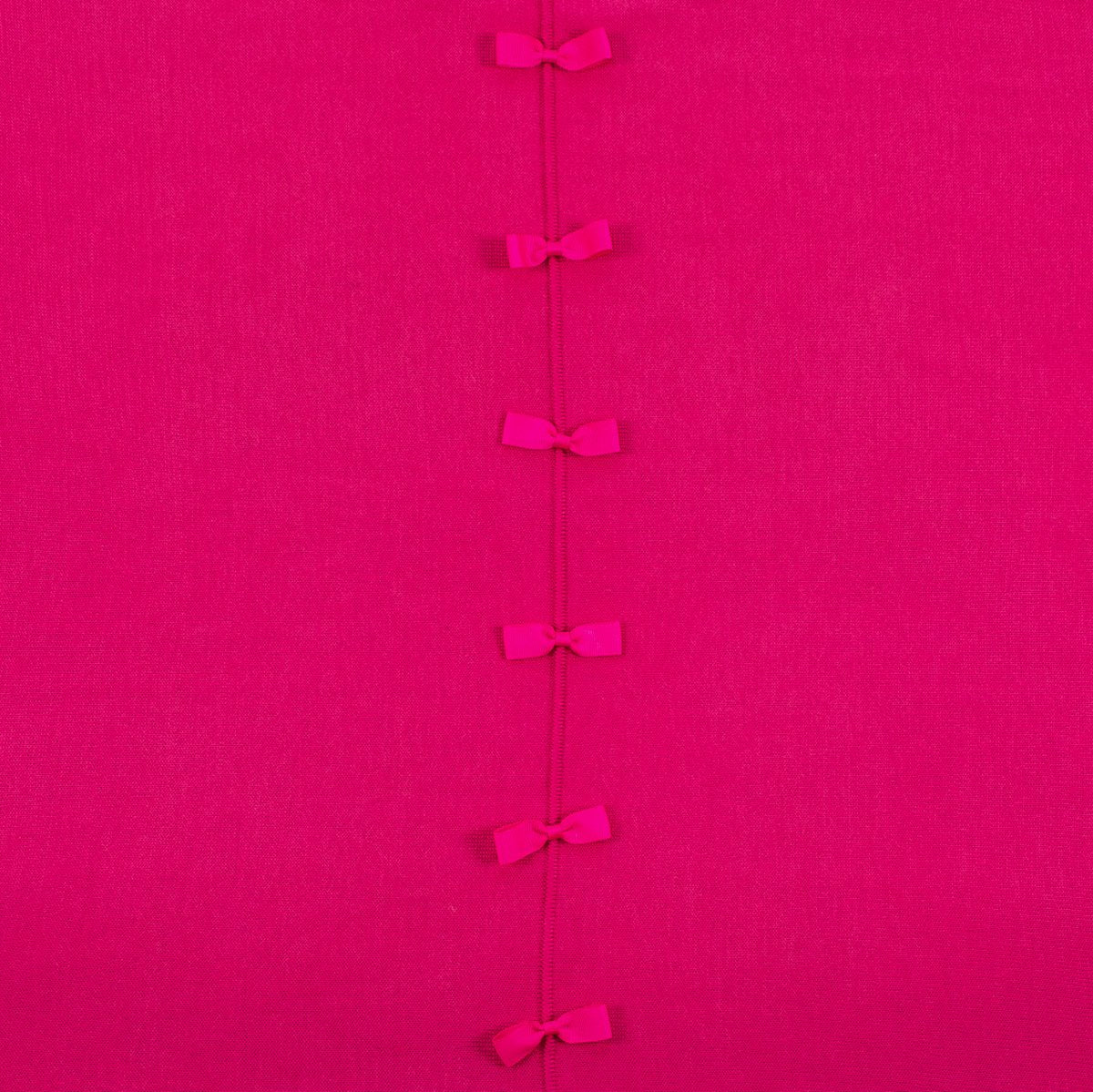 Ginger Toby bow back jumper, hot pink, detail view